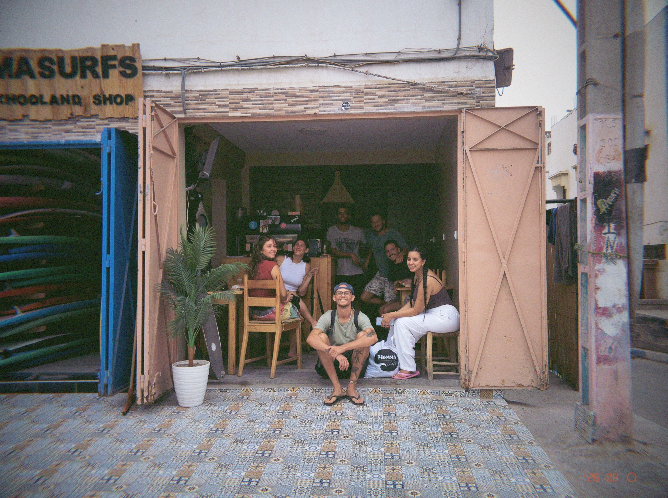 Friends gathered at the Momma Surfs shop in Anza