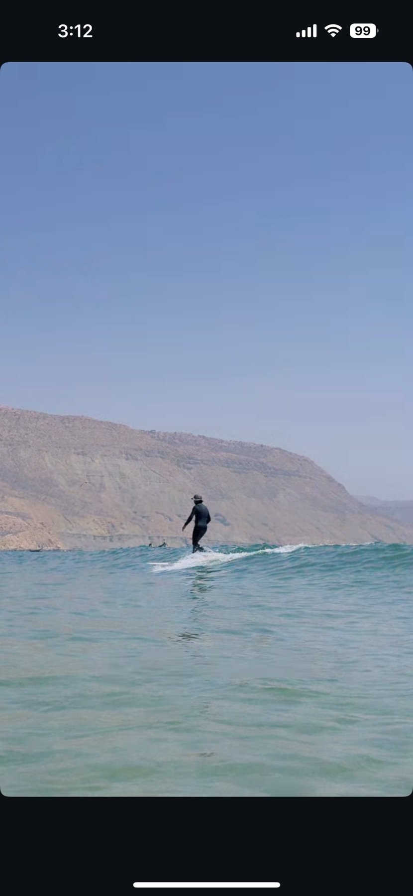 Longboard surfer on an Anza wave